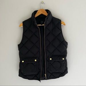 Jcrew women’s black quilted vest.
